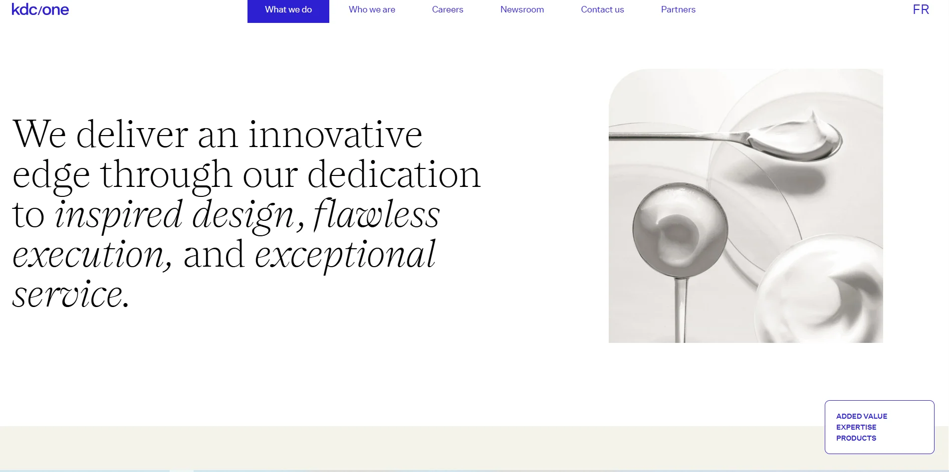 highlighting dedication to design, execution, and service with an image of a spoon with cream.